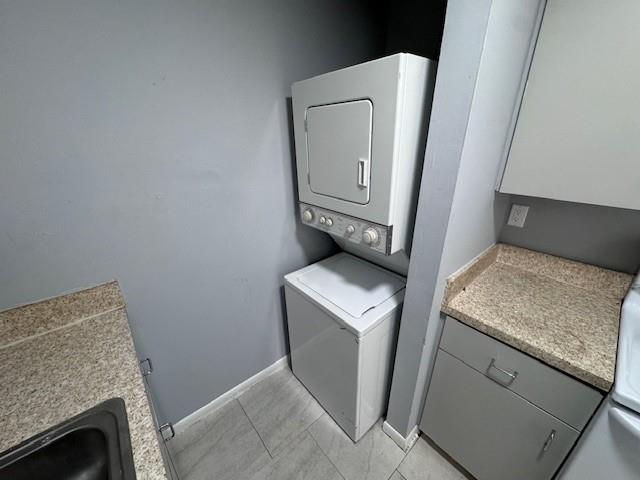 1109 West 28th Street, Unit 4 Riviera Beach, FL 33404 - Photo 7 of 12 a utility room with dryer and washer