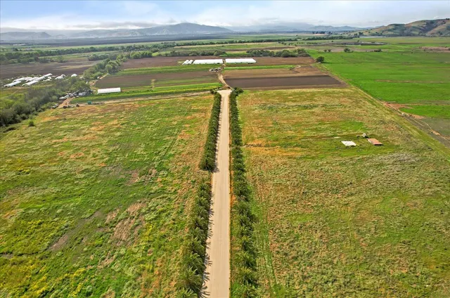 a view of a road with an ocean view