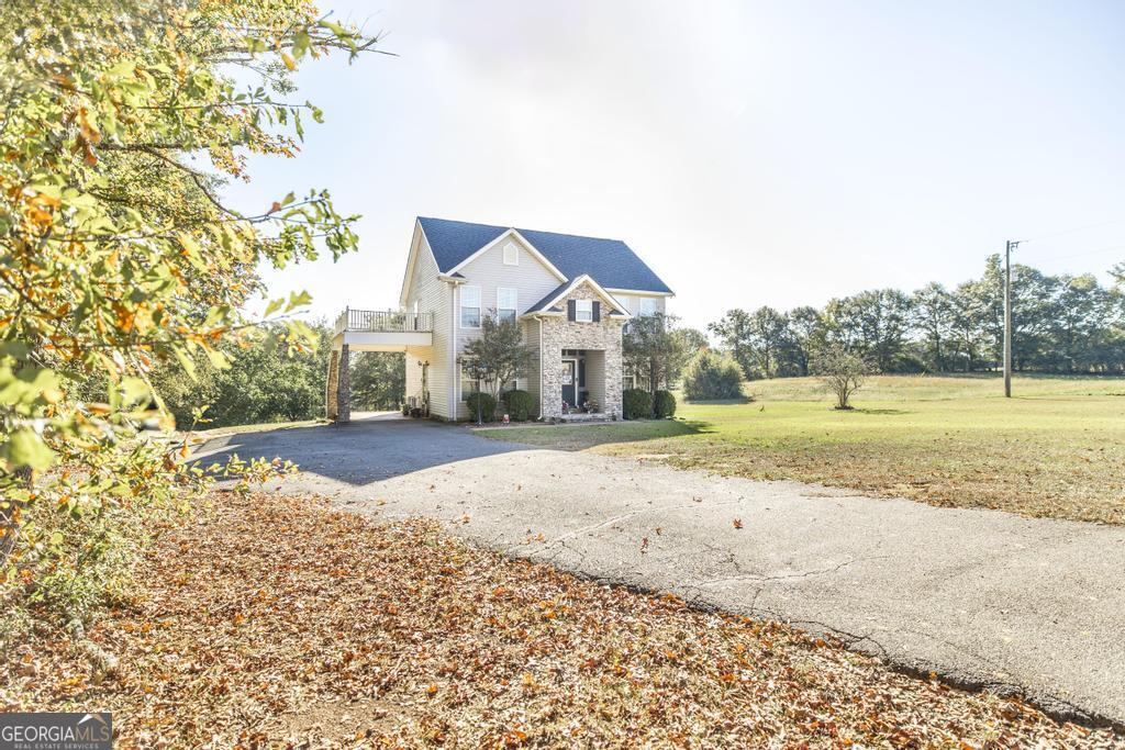 1550 Charlie Benson Road Forsyth, GA 31029 - Photo 1 of 51