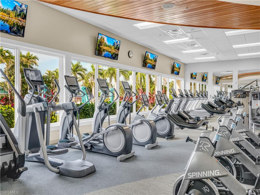 14695 Edgewater Circle Naples, FL 34114 - Photo 32 of 39 a view of a room with gym equipment