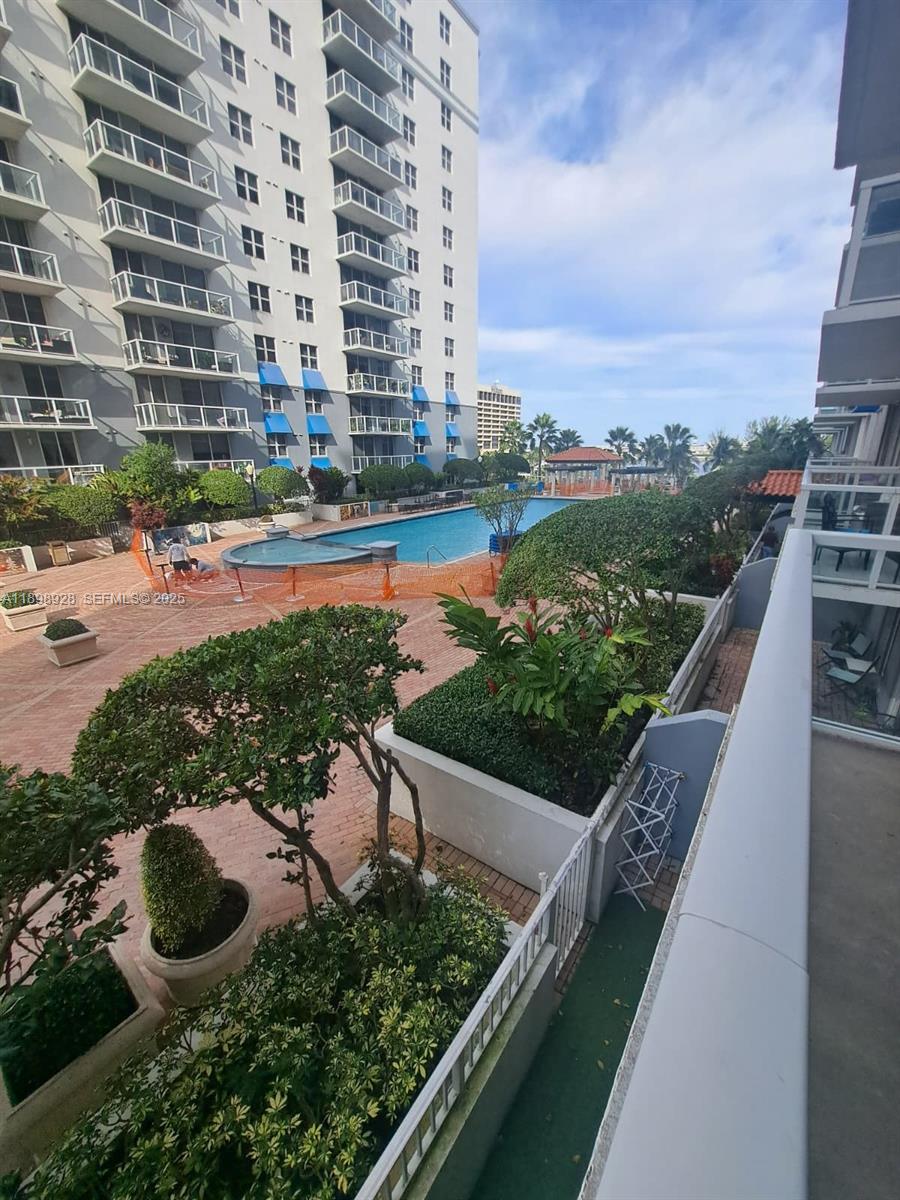 a view of a city with tall buildings