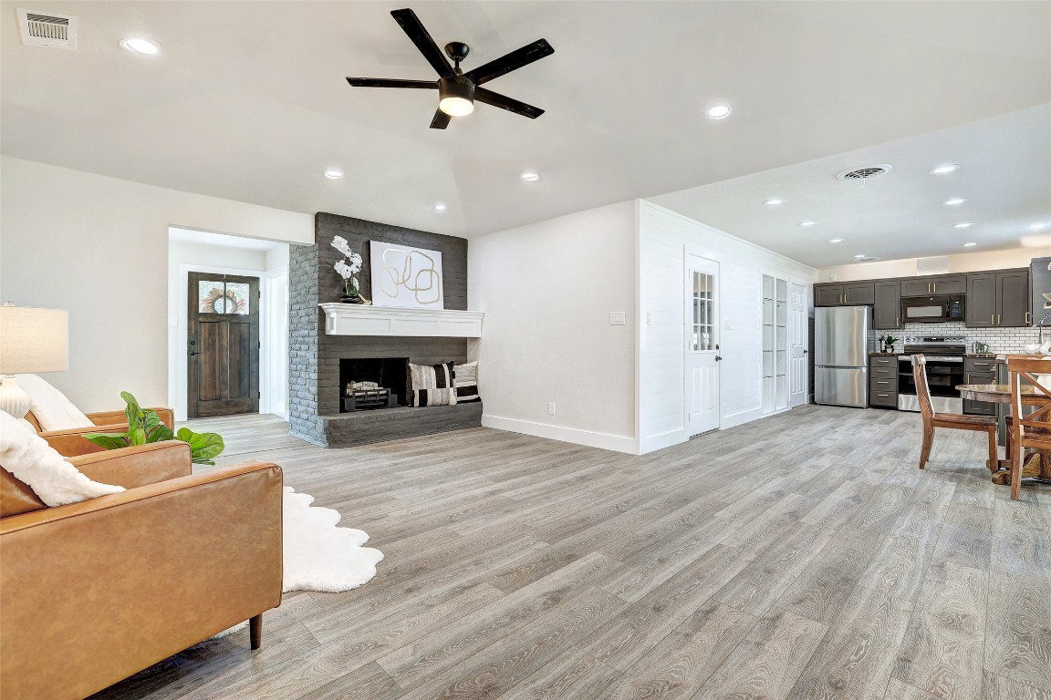 805 River Bend Georgetown, TX 78628 - Photo 1 of 1 a living room with furniture and a fireplace