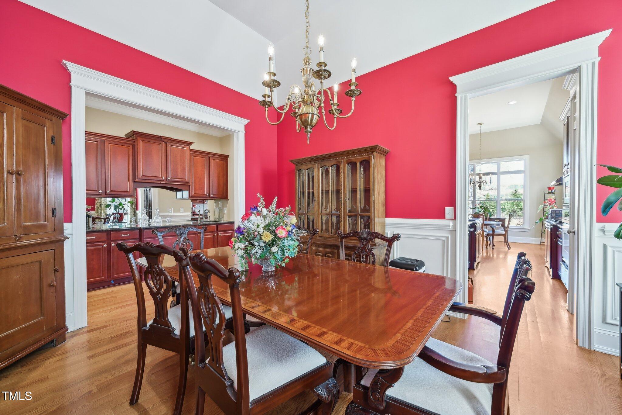 301 Kinsale Drive Durham, NC 27707 - Photo 11 of 68 a view of a dining room with furniture and chandelier