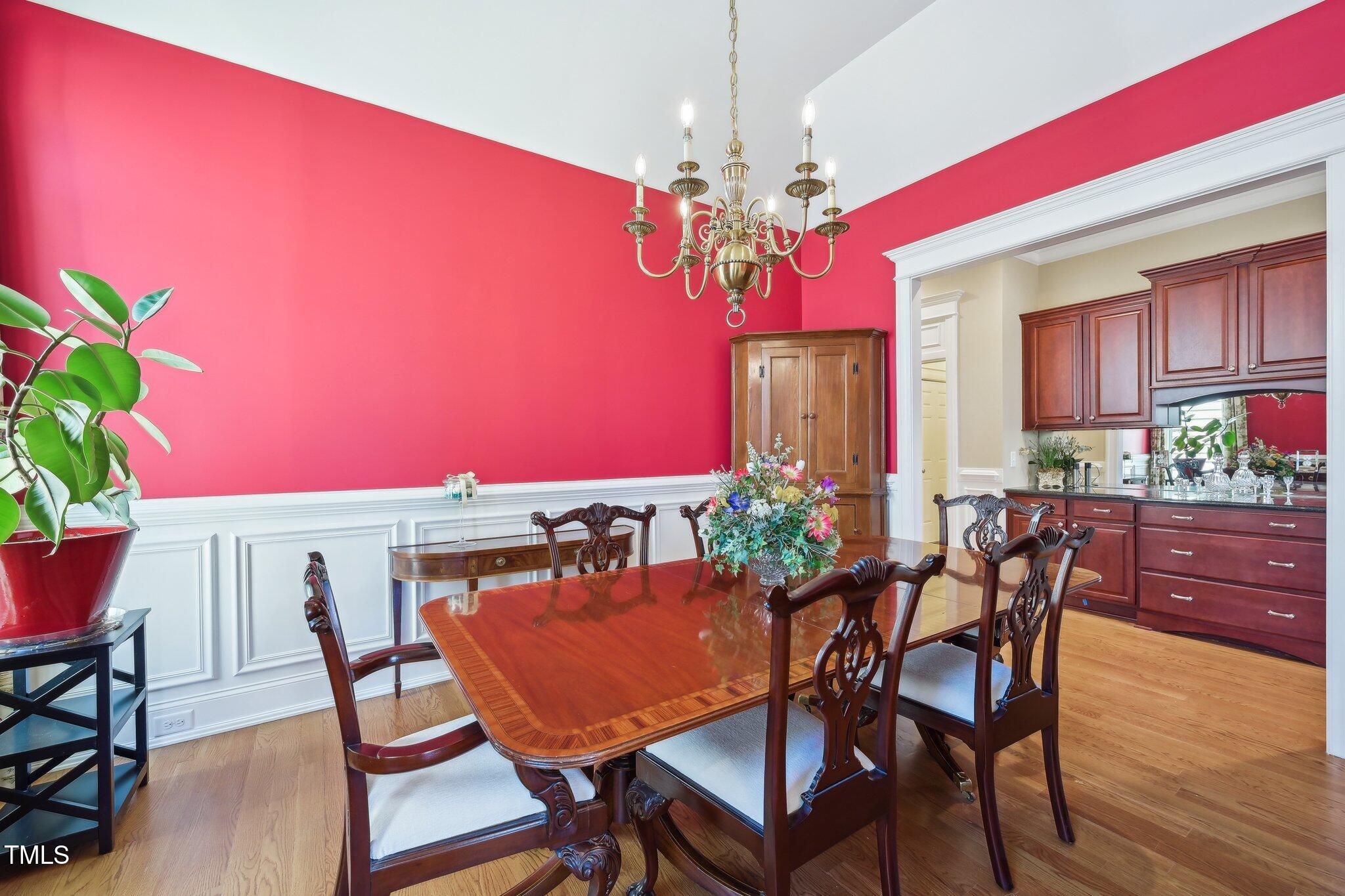 301 Kinsale Drive Durham, NC 27707 - Photo 12 of 68 a view of a dining room with furniture and a chandelier