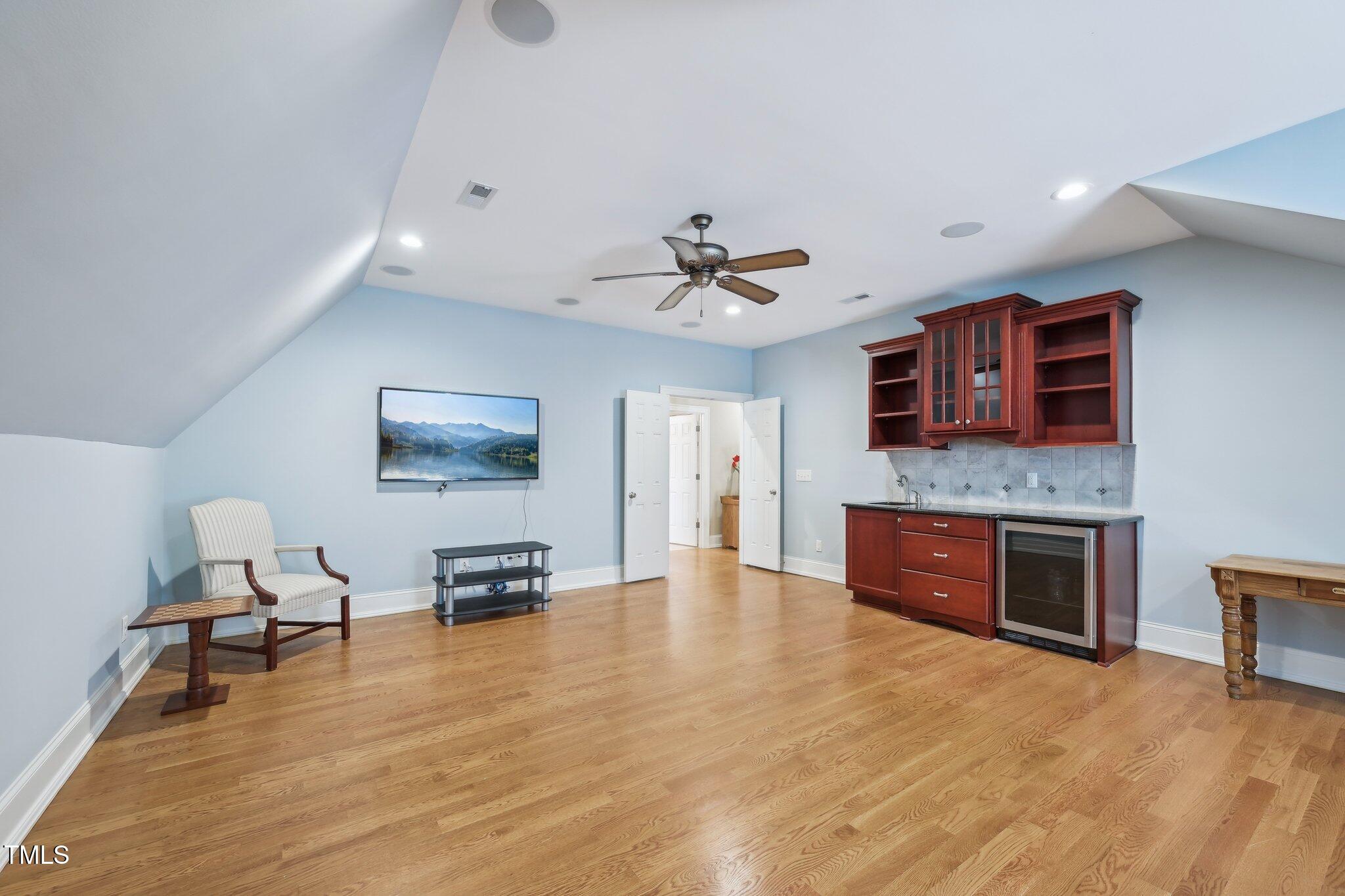 301 Kinsale Drive Durham, NC 27707 - Photo 51 of 68 a living room with furniture and a fireplace