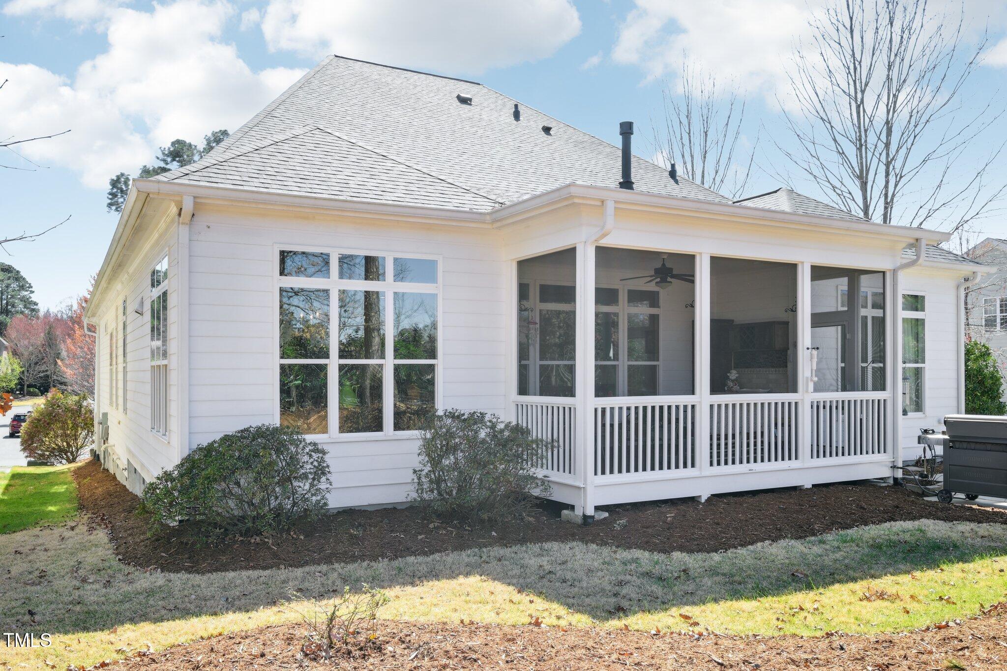 301 Kinsale Drive Durham, NC 27707 - Photo 59 of 68 a front view of a house with garden