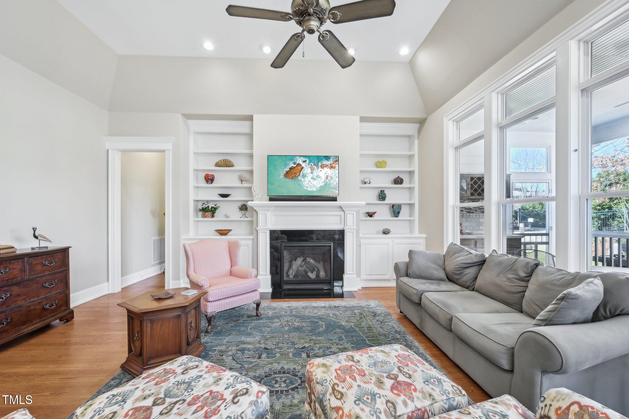 301 Kinsale Drive Durham, NC 27707 - Photo 8 of 68 a living room with furniture and a fireplace