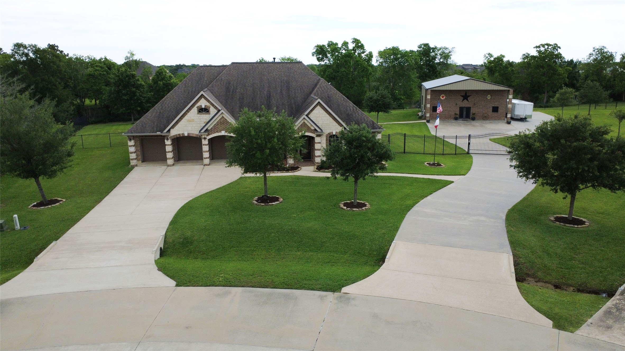 6202 Circle Back Road Baytown, TX 77523 - Photo 6 of 50 Double driveway with gate on one side