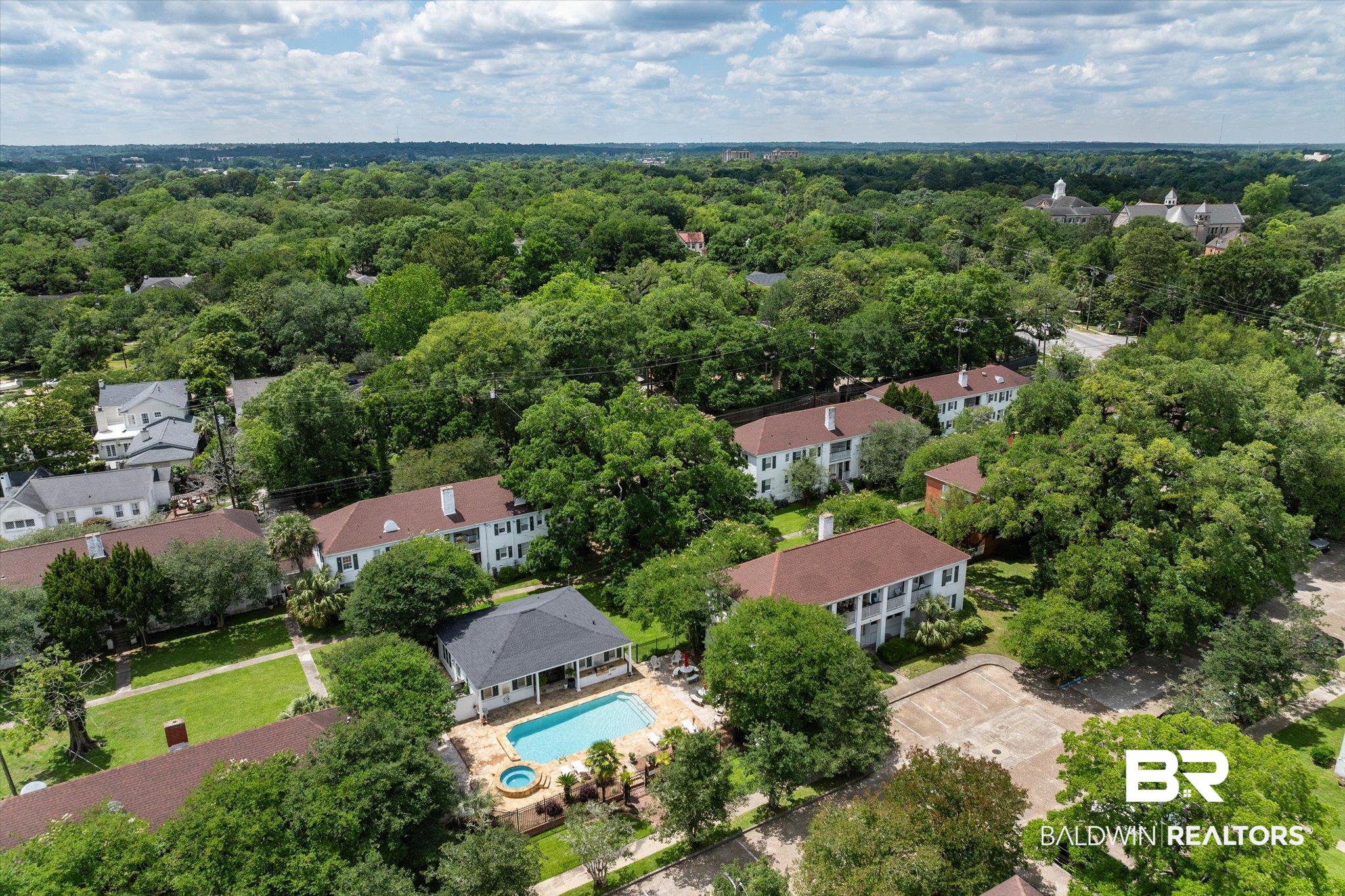 214 Upham Street, Unit 18C Mobile, AL 36607 - Photo 26 of 35 Drone / aerial view of a pool