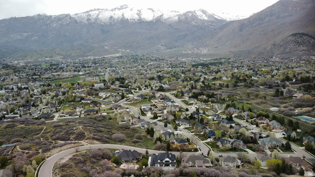 614 East High Lane Alpine, UT 84004 - Photo 27 of 75 Aerial overview of property's location with nearby suburban area and a mountainous background