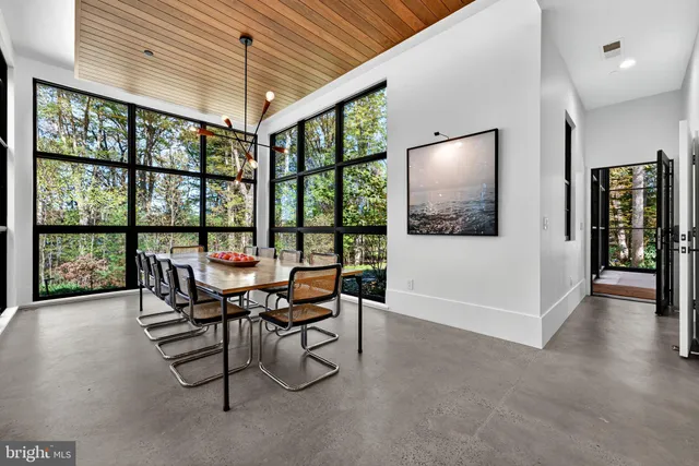 a bathroom with a toilet a sink and a mirror