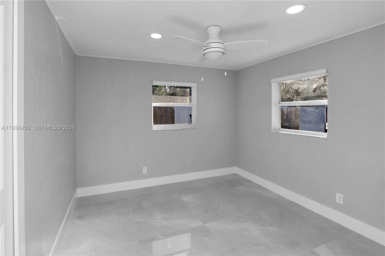 5730 Greene Street Hollywood, FL 33021 - Photo 16 of 27 an empty room with windows