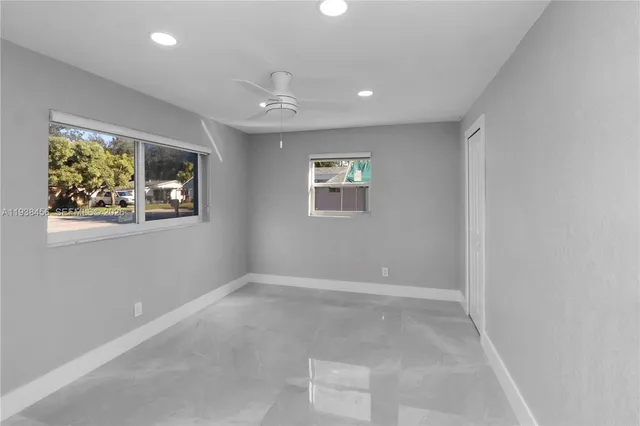 an empty room with windows