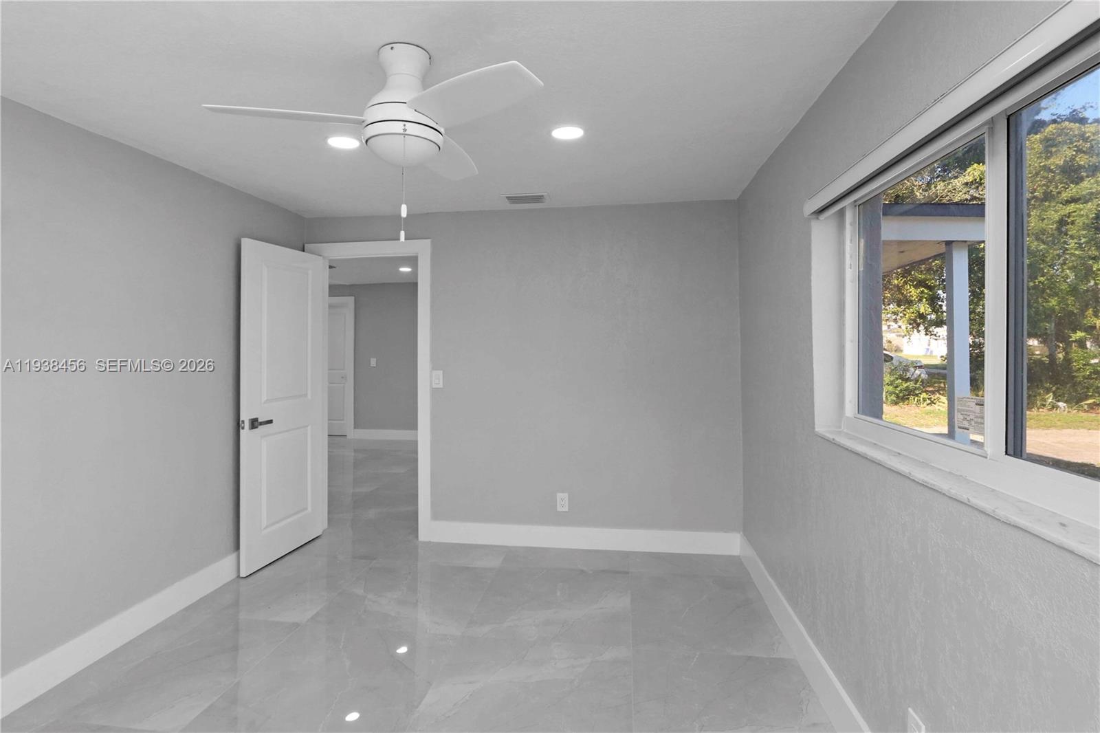 5730 Greene Street Hollywood, FL 33021 - Photo 20 of 27 a view of an empty room with a window