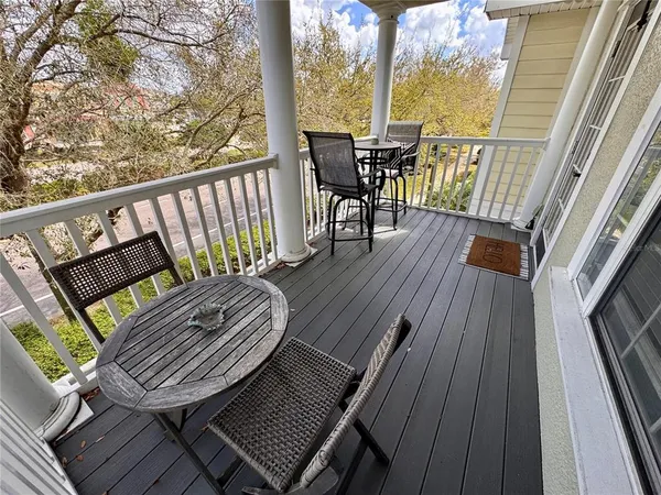 a view of a chairs in wooden deck