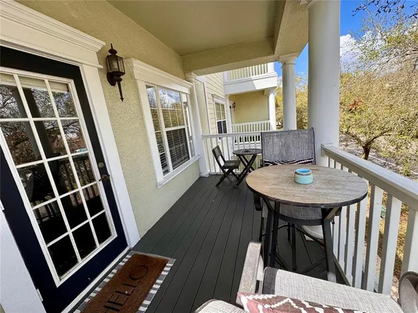a bedroom with a bed and ceiling fan