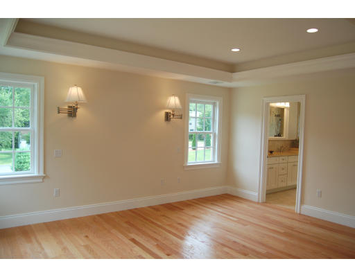 3 Graham Road Lexington, MA 02420 - Photo 11 of 26 a view of an empty room with wooden floor and a window