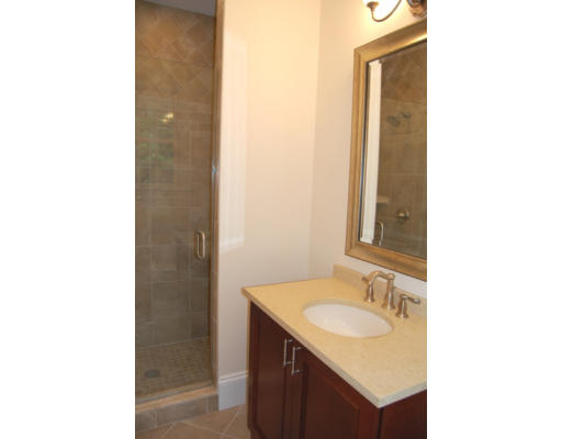 3 Graham Road Lexington, MA 02420 - Photo 20 of 26 a bathroom with a sink and a mirror