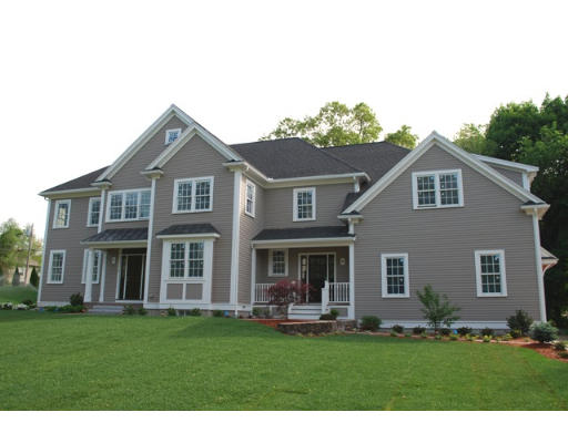3 Graham Road Lexington, MA 02420 - Photo 21 of 26 a front view of a house with a garden