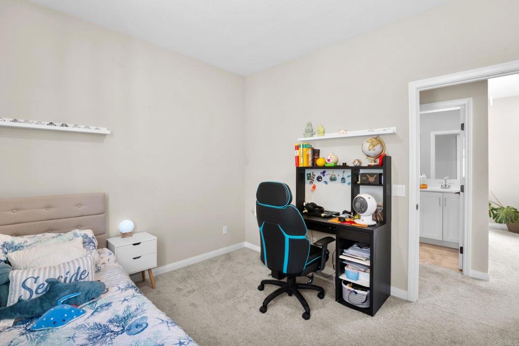 1751 Whitmore Loop Chula Vista, CA 91913 - Photo 17 of 44 a work room with furniture and a wooden floor