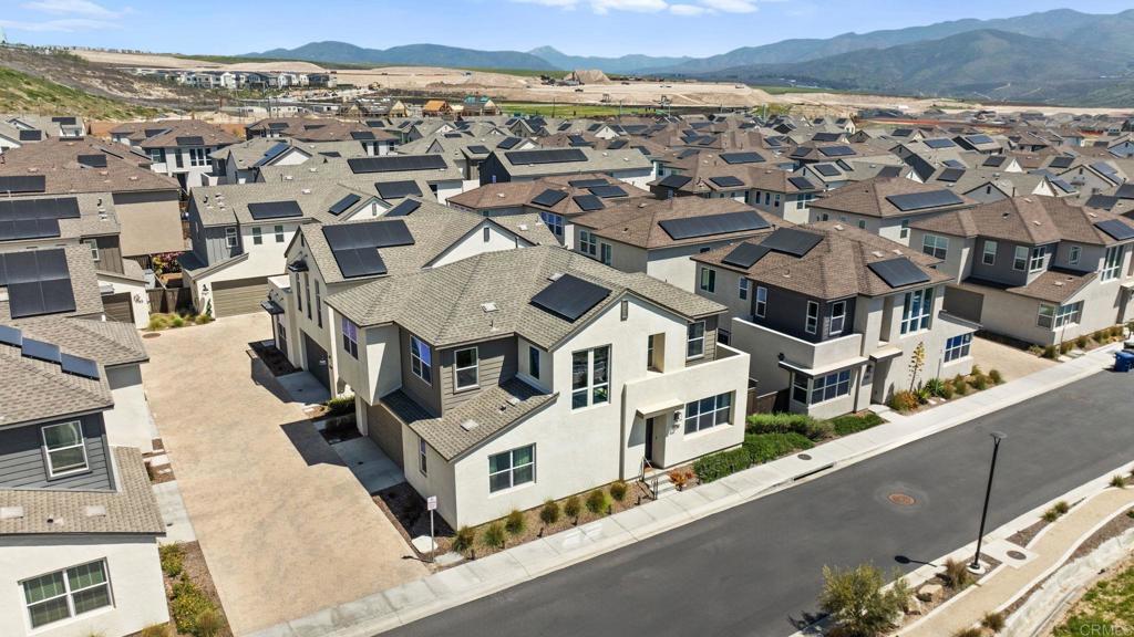 1751 Whitmore Loop Chula Vista, CA 91913 - Photo 33 of 44 an aerial view of residential houses with outdoor space