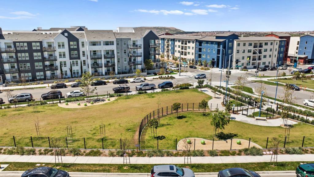 1751 Whitmore Loop Chula Vista, CA 91913 - Photo 38 of 44 a view of a swimming pool with outdoor seating