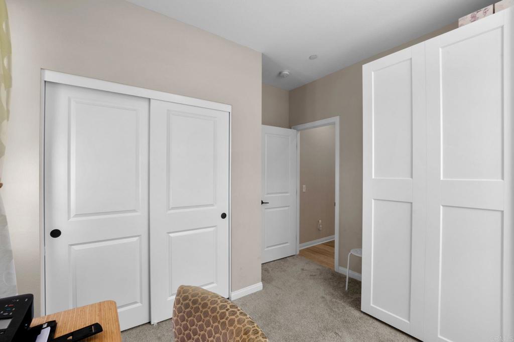 1751 Whitmore Loop Chula Vista, CA 91913 - Photo 10 of 44 a view of room with walk in closet and bedroom