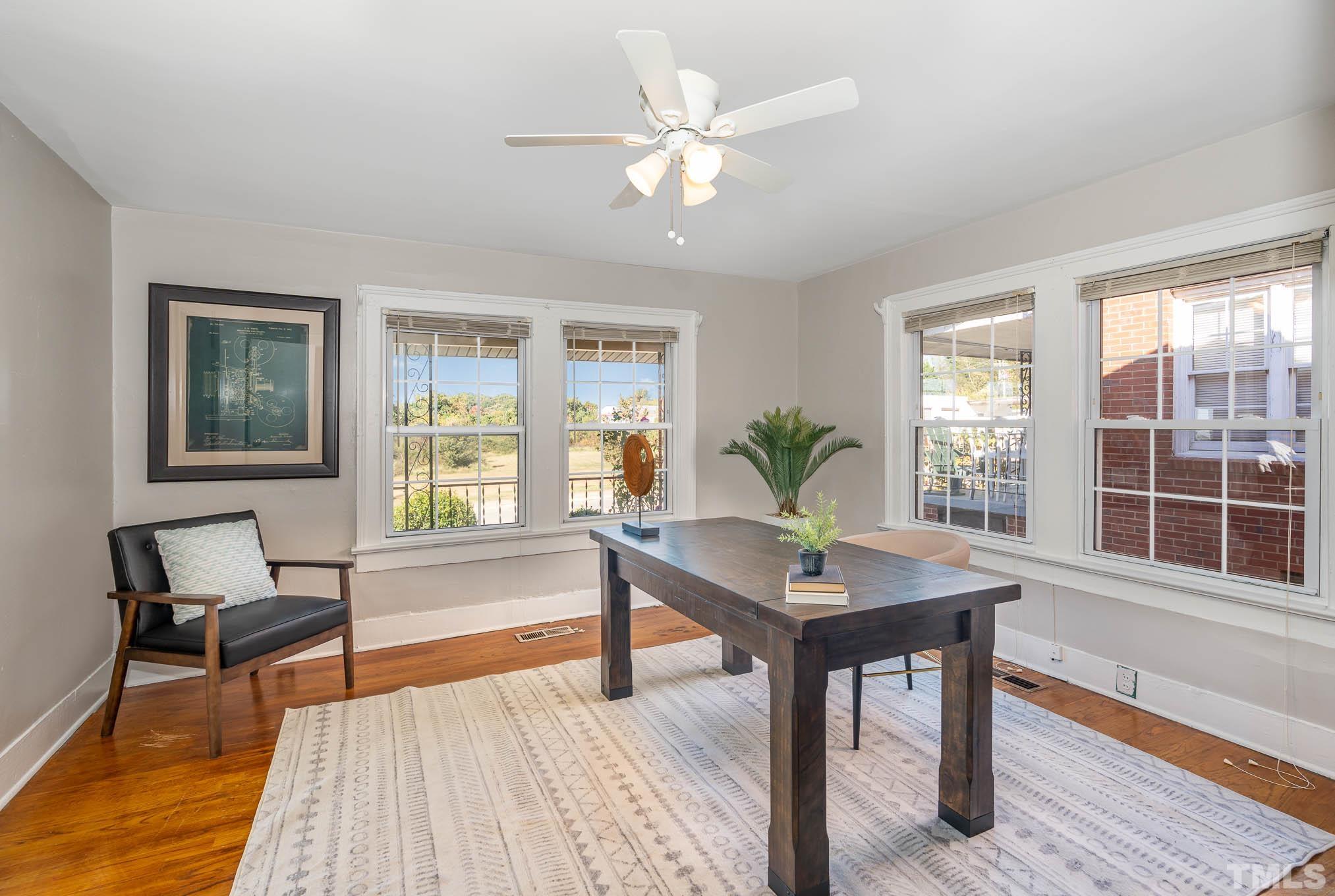 1415 Garner Road Raleigh, NC 27610 - Photo 6 of 15 a workspace with furniture window and wooden floor