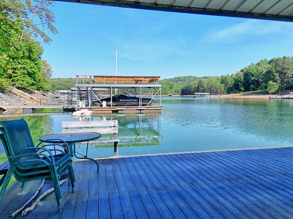 456 Deaver Cove Road Blairsville, GA 30512 - Photo 69 of 83 a view of a chairs and table in patio