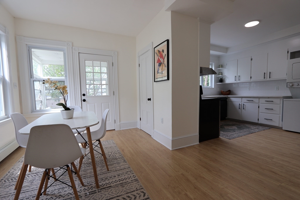 331 Proctor Avenue Revere, MA 02151 - Photo 7 of 29 a view of a dining room with furniture and wooden floor