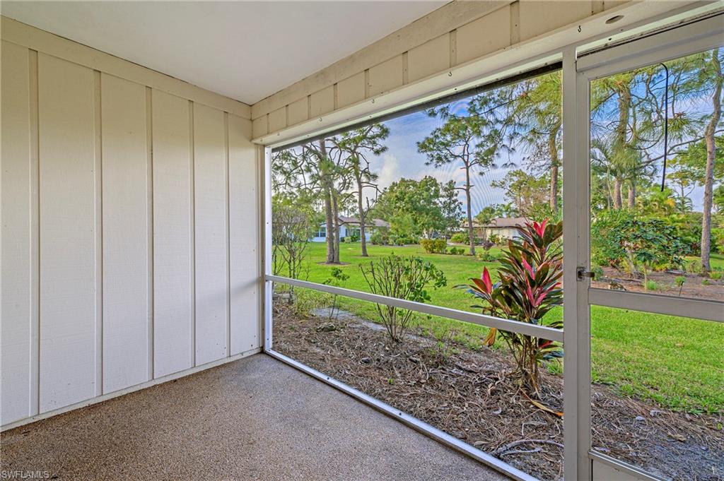 1007 Pine Isle Lane, Unit 1007 Naples, FL 34112 - Photo 14 of 20 a view of a garden