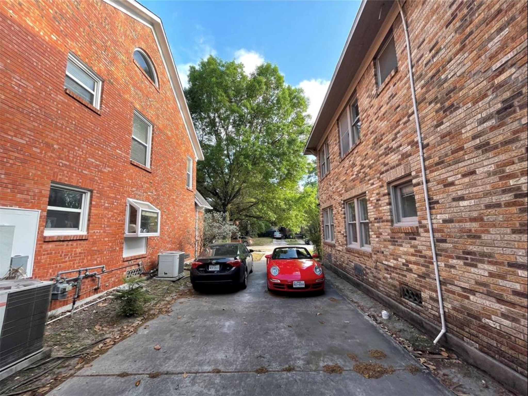 1706 Hawthorne Street Houston, TX 77098 - Photo 19 of 25 a car parked in front of a brick building