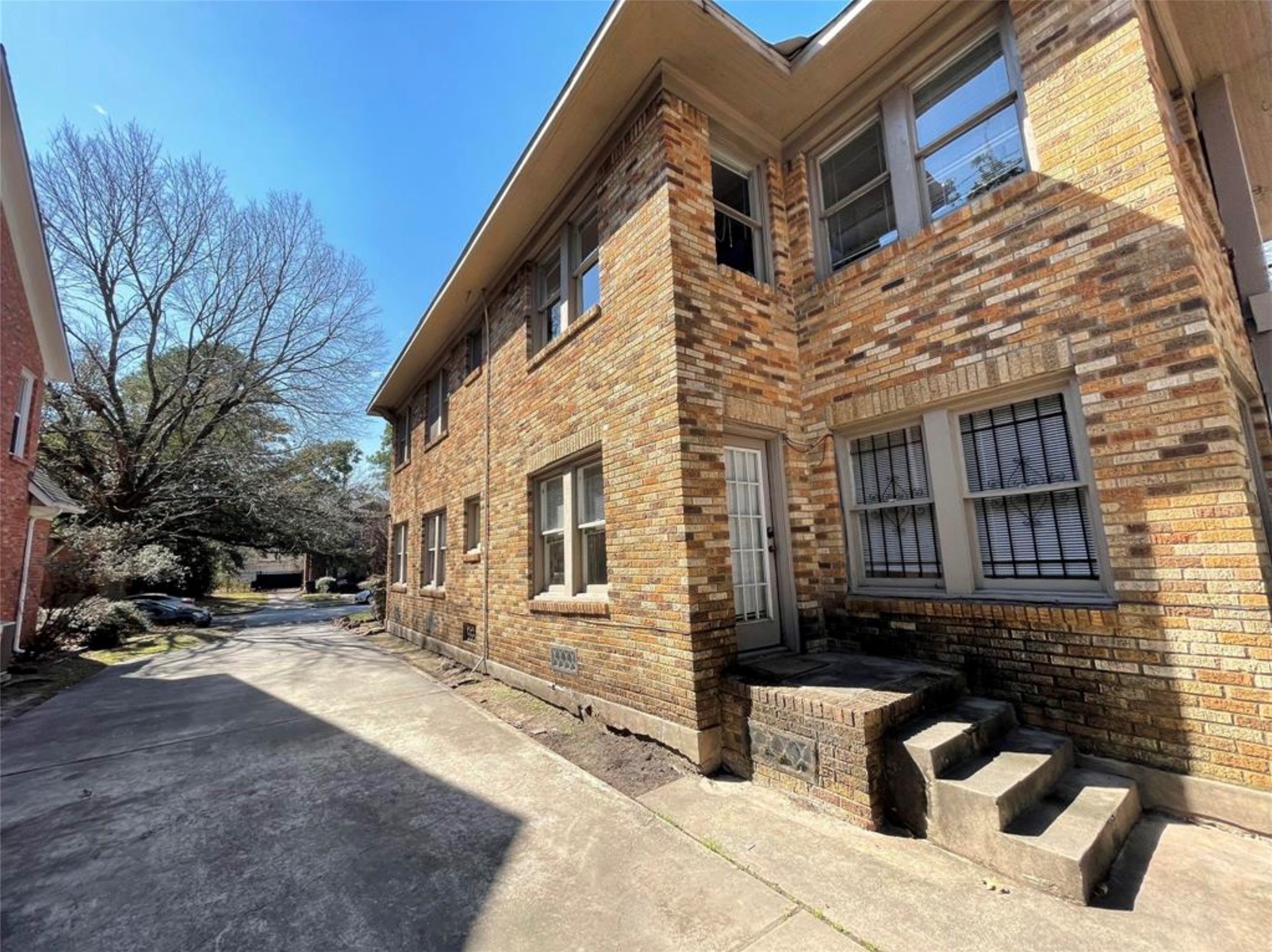 1706 Hawthorne Street Houston, TX 77098 - Photo 23 of 25 a view of a house with snow on the road