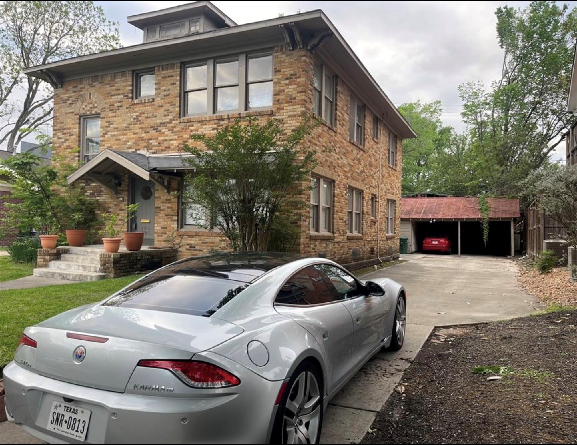 1706 Hawthorne Street Houston, TX 77098 - Photo 25 of 25 a front view of a house with car parked