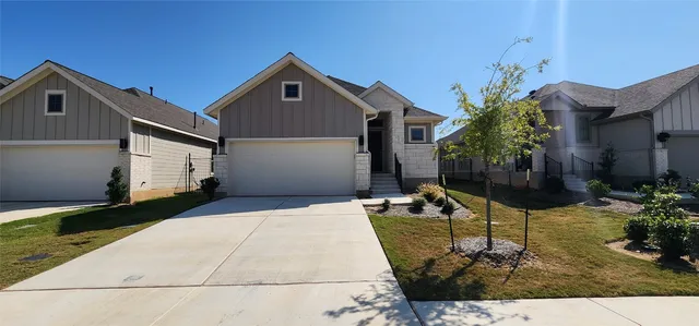 a backyard of a house with seating space