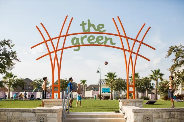 a group of cars parked on the side of a road