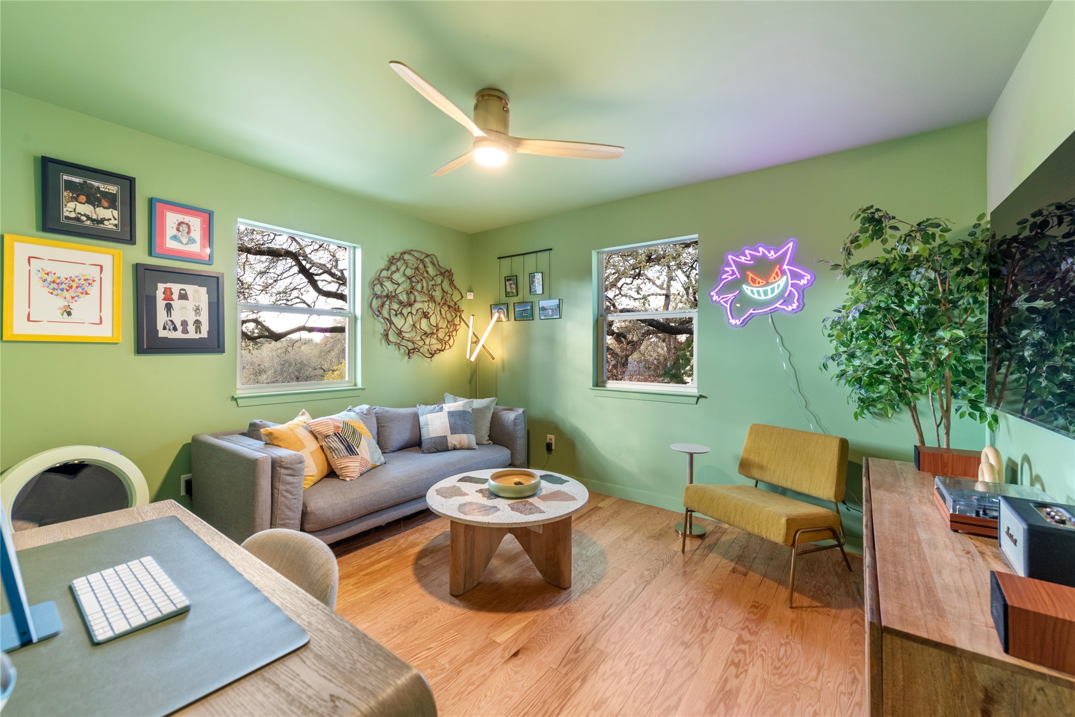 1106 Mission Ridge, Unit B Austin, TX 78704 - Photo 15 of 27 a living room with furniture and a flat screen tv