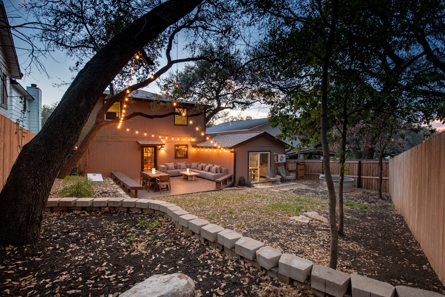1106 Mission Ridge, Unit B Austin, TX 78704 - Photo 24 of 27 a view of a house with a yard