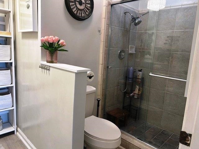 4396 Baldwin Avenue, Unit 82 Little River, SC 29566 - Photo 15 of 31 Bathroom featuring toilet and a stall shower