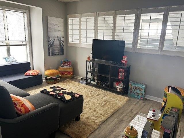4396 Baldwin Avenue, Unit 82 Little River, SC 29566 - Photo 19 of 31 3rd bedroom area with wood finished floors and baseboards