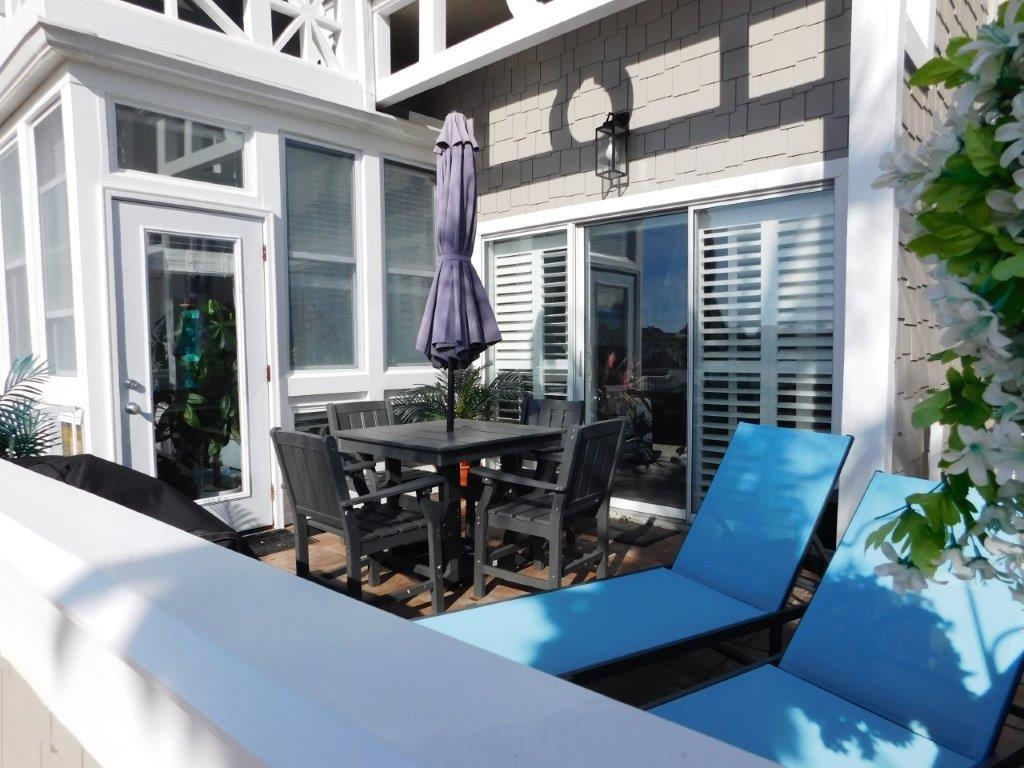 4396 Baldwin Avenue, Unit 82 Little River, SC 29566 - Photo 21 of 31 View of patio featuring outdoor dining space