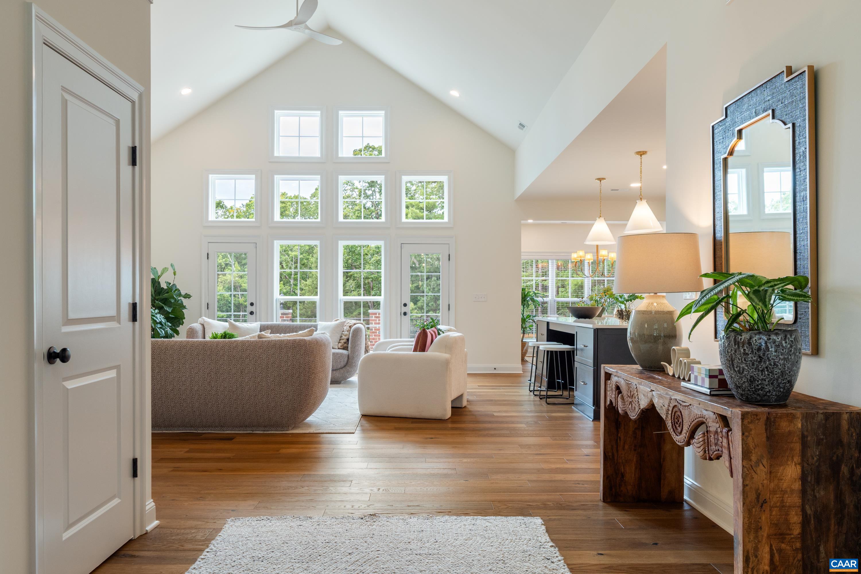 240 Campbell Road Keswick, VA 22947 - Photo 11 of 68 a living room with furniture and a potted plant