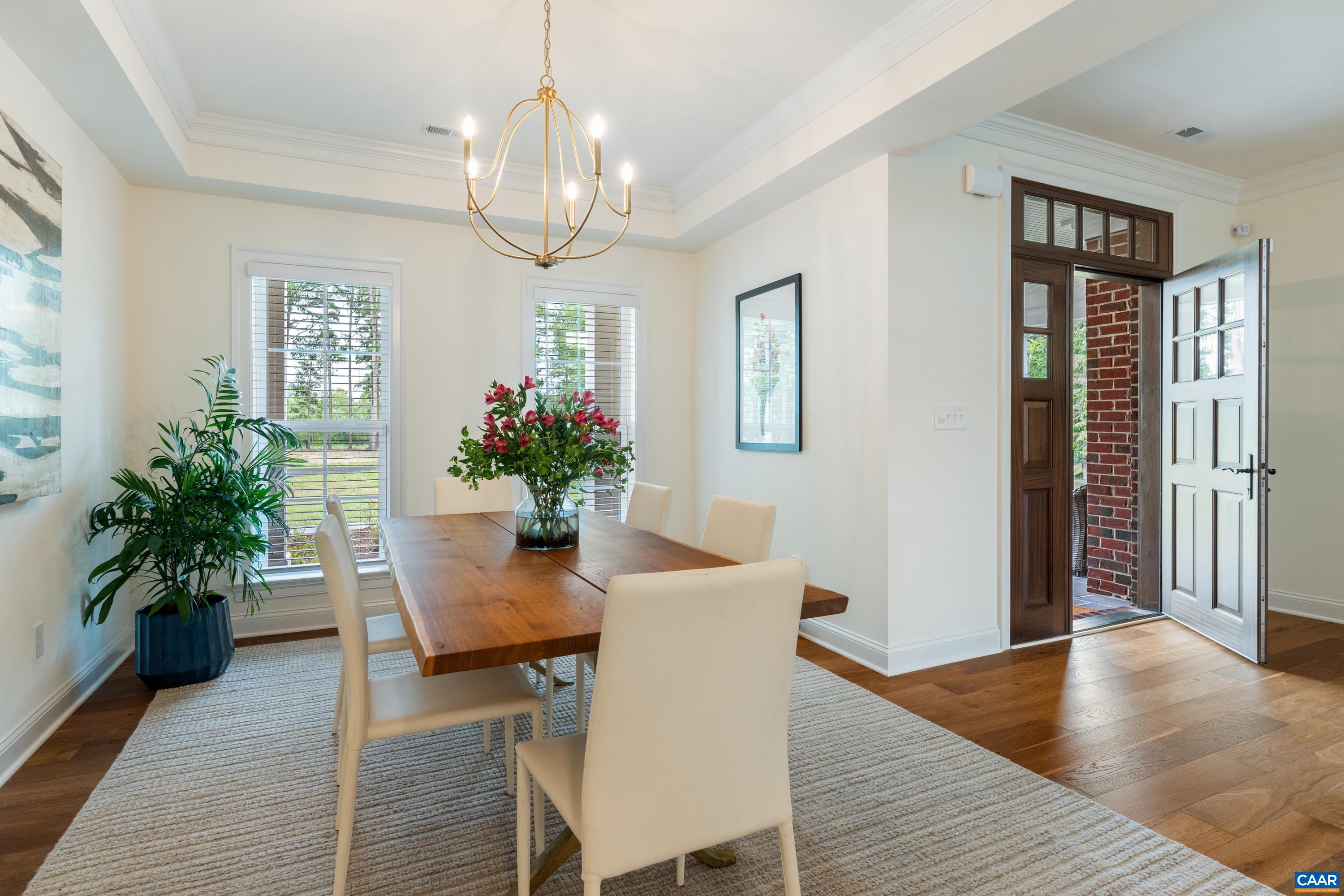 240 Campbell Road Keswick, VA 22947 - Photo 14 of 68 a view of a dining room with furniture and wooden floor