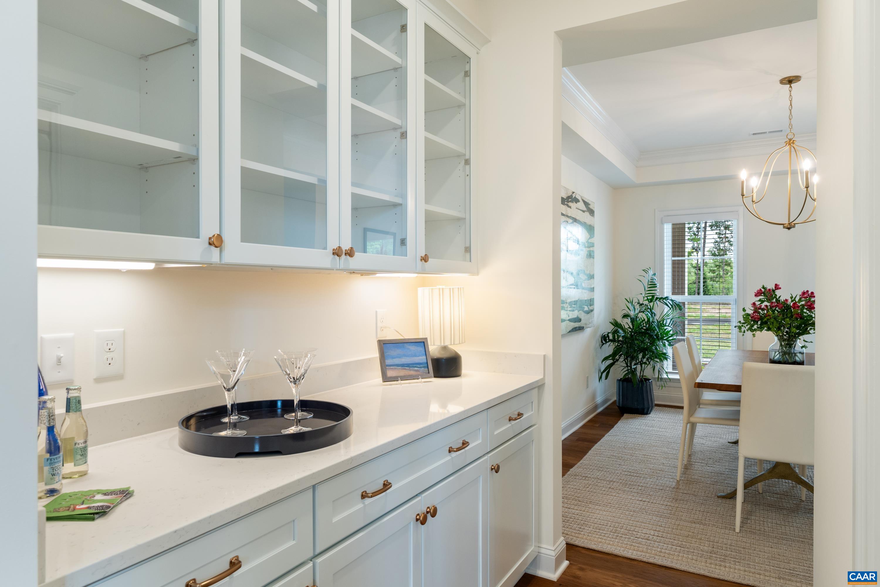 240 Campbell Road Keswick, VA 22947 - Photo 26 of 68 a kitchen with a sink and cabinets