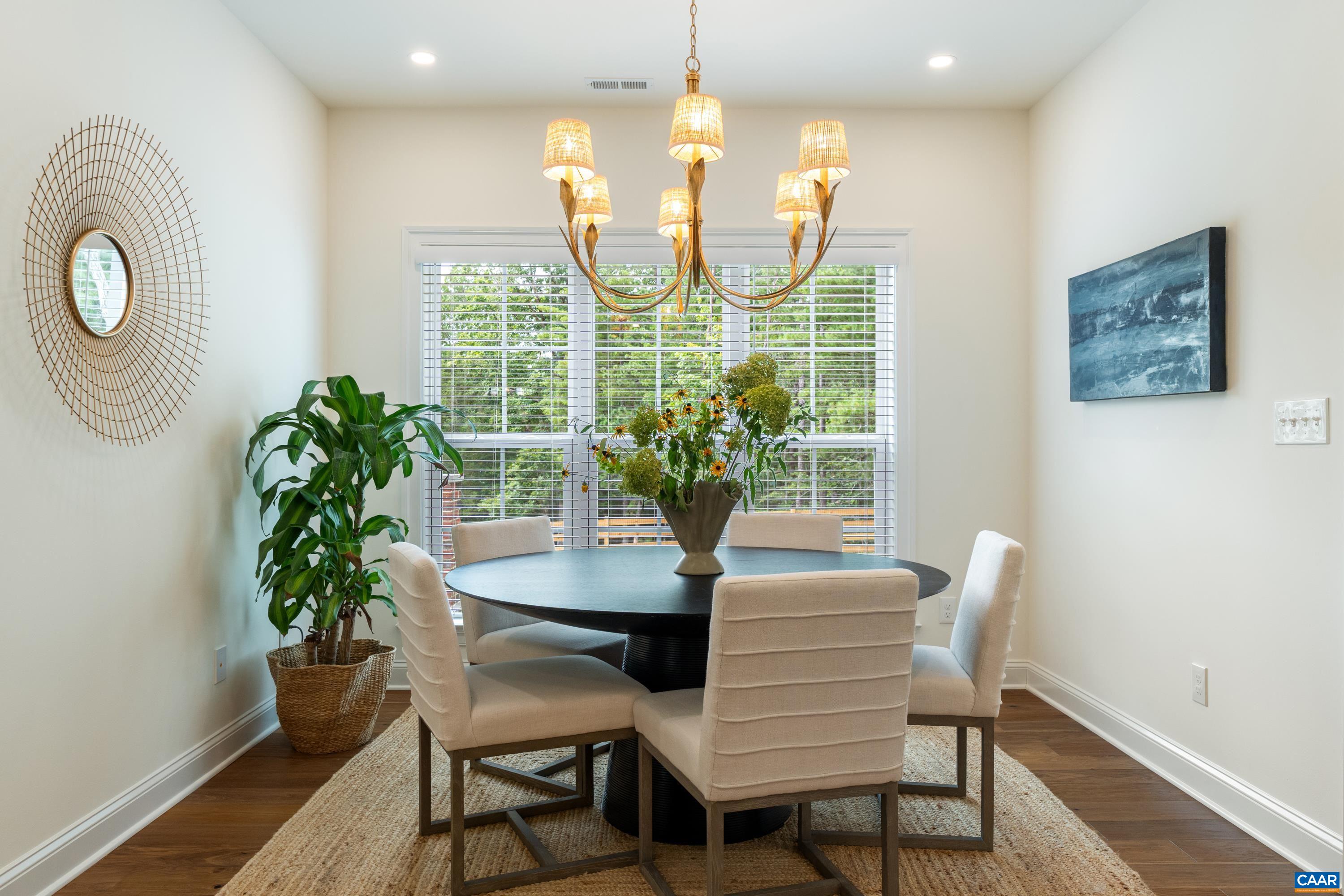 240 Campbell Road Keswick, VA 22947 - Photo 29 of 68 a dining room with furniture and a window