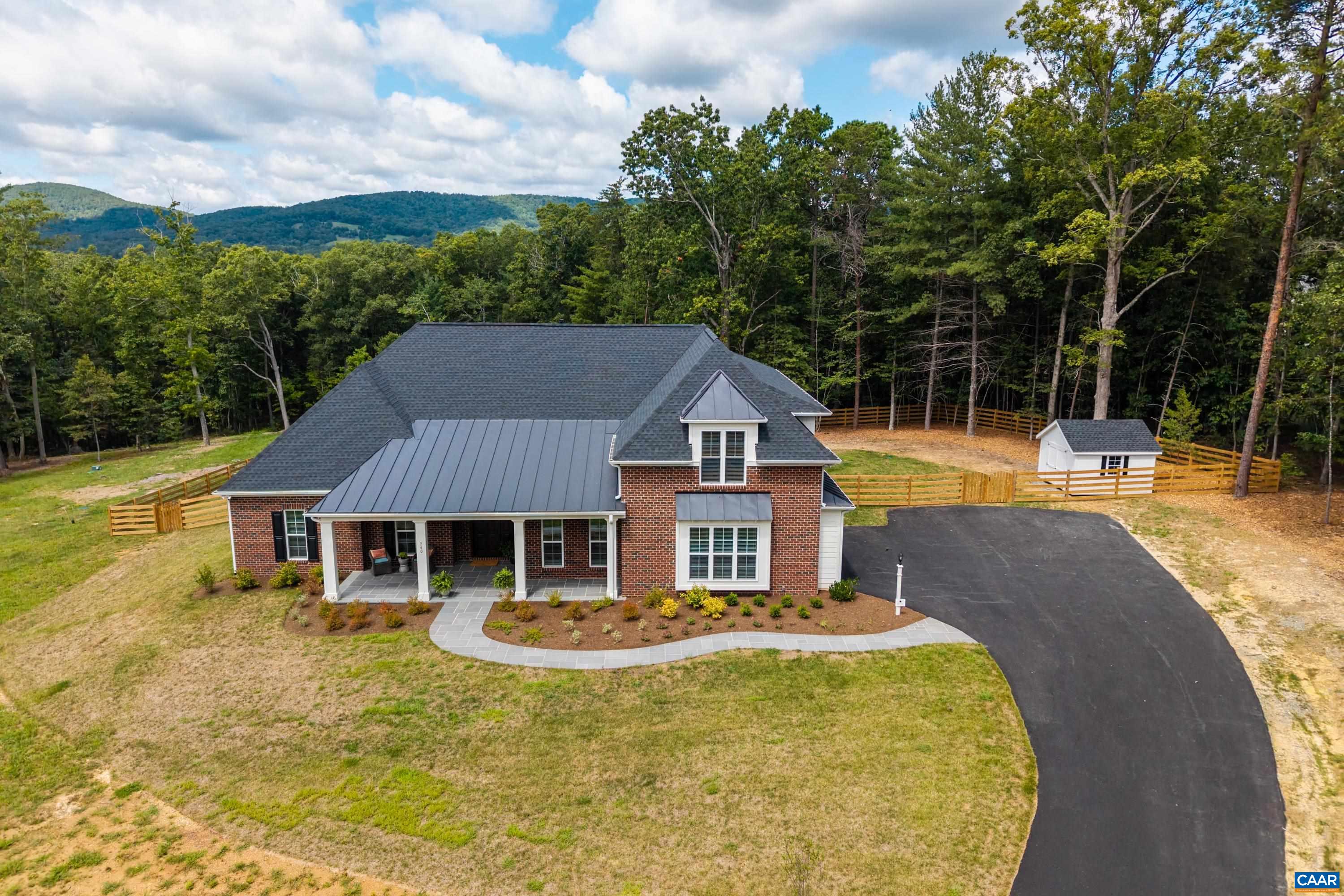 240 Campbell Road Keswick, VA 22947 - Photo 3 of 68 a house with swimming pool in front of it
