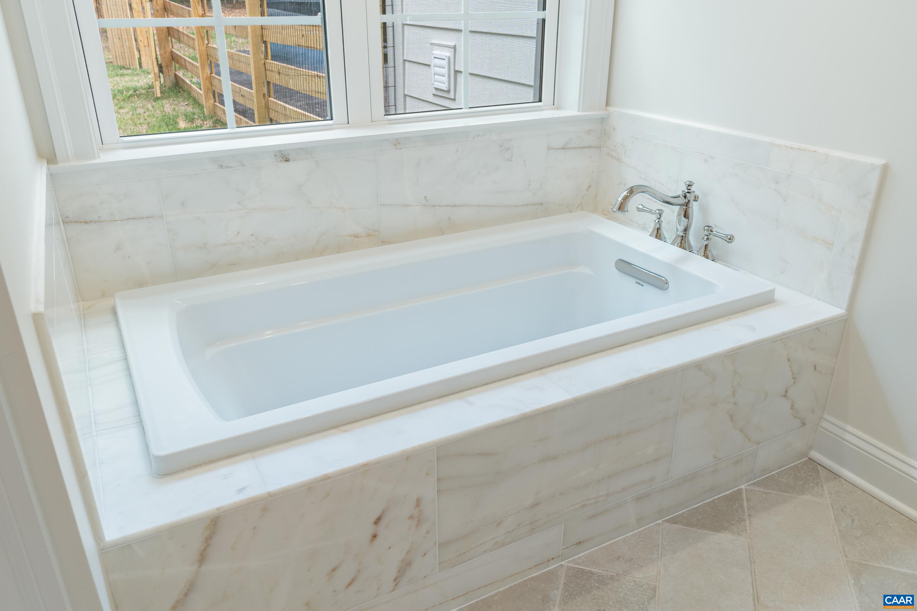 240 Campbell Road Keswick, VA 22947 - Photo 37 of 68 a bathroom with bathtub