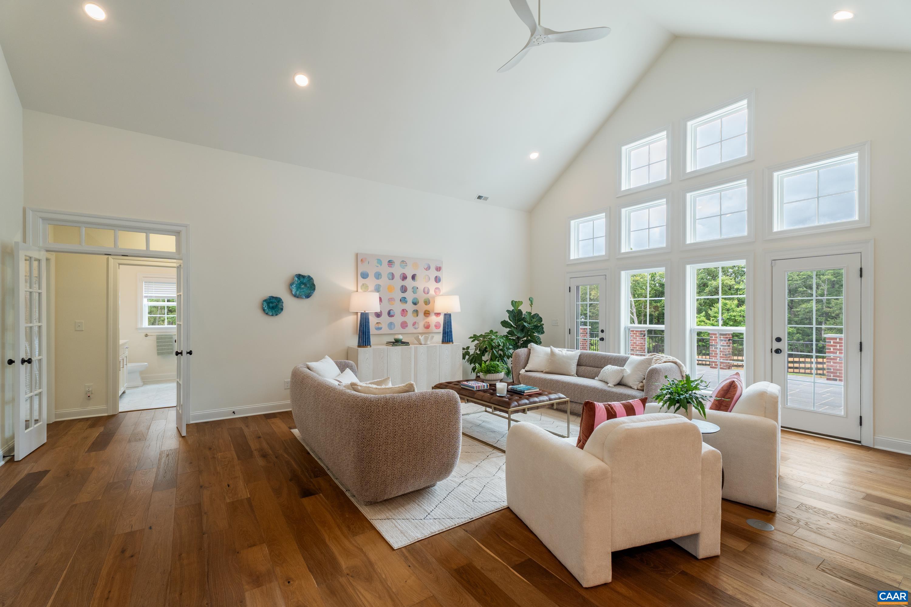 240 Campbell Road Keswick, VA 22947 - Photo 40 of 68 a living room with furniture and a large window