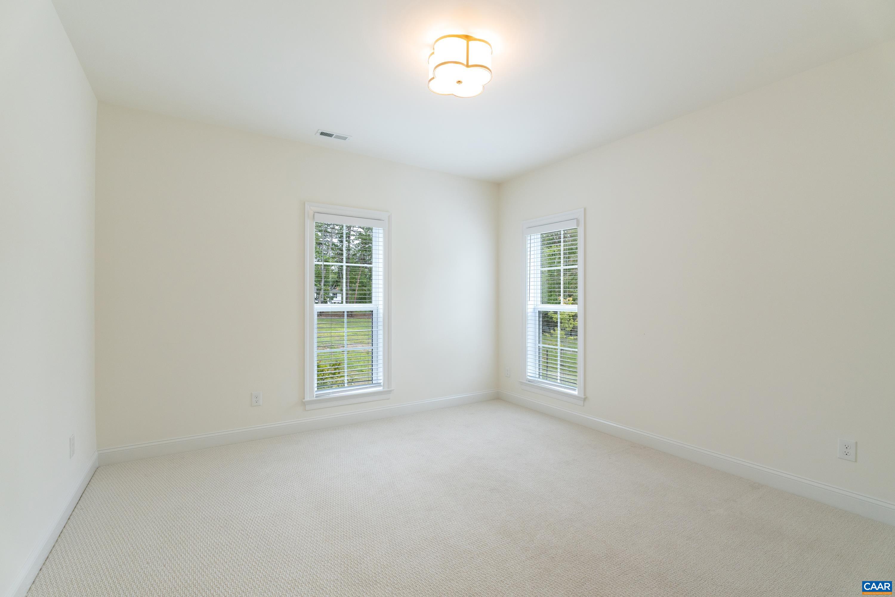 240 Campbell Road Keswick, VA 22947 - Photo 45 of 68 an empty room with a window