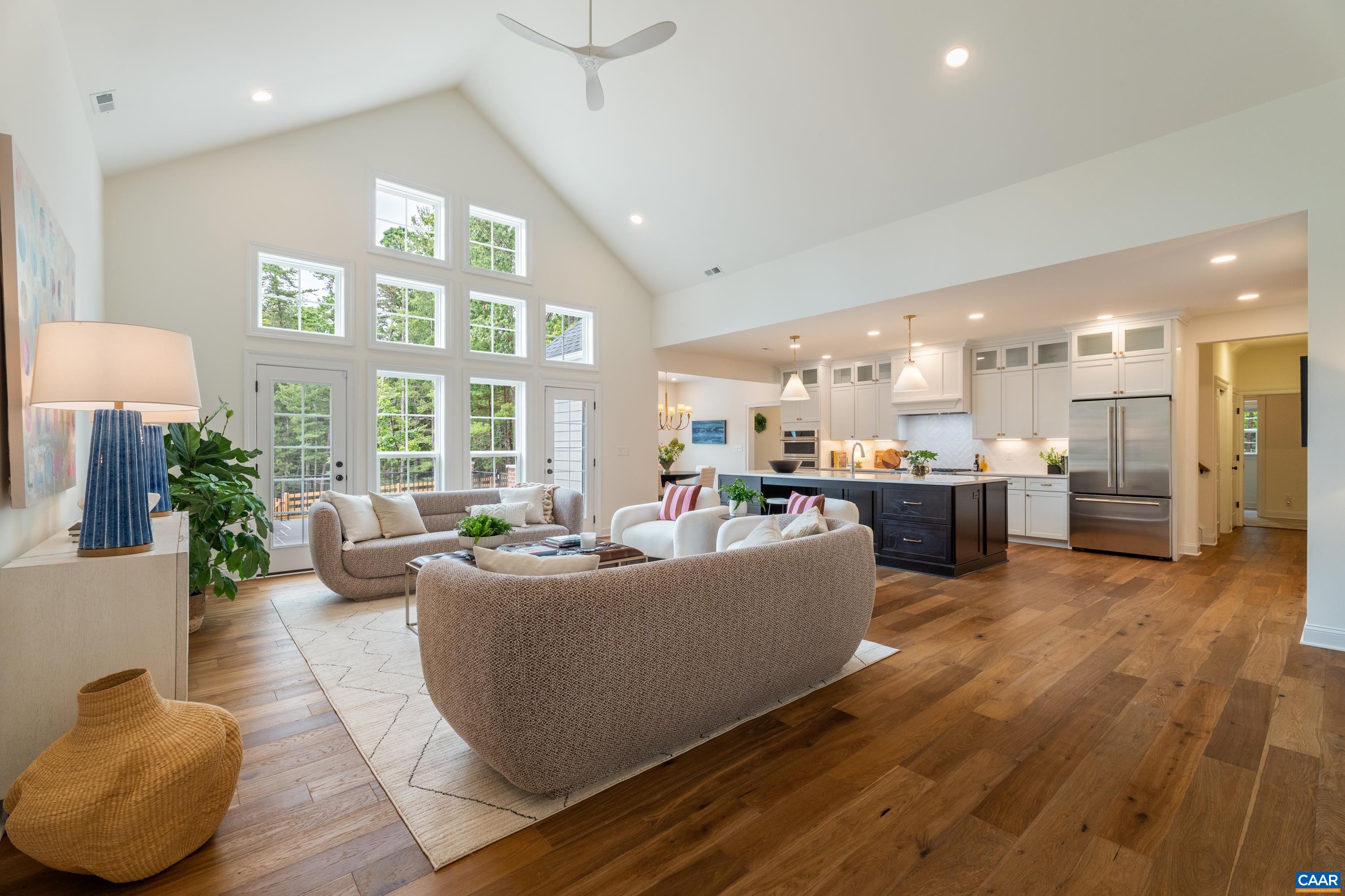 240 Campbell Road Keswick, VA 22947 - Photo 46 of 68 a living room with furniture and kitchen view